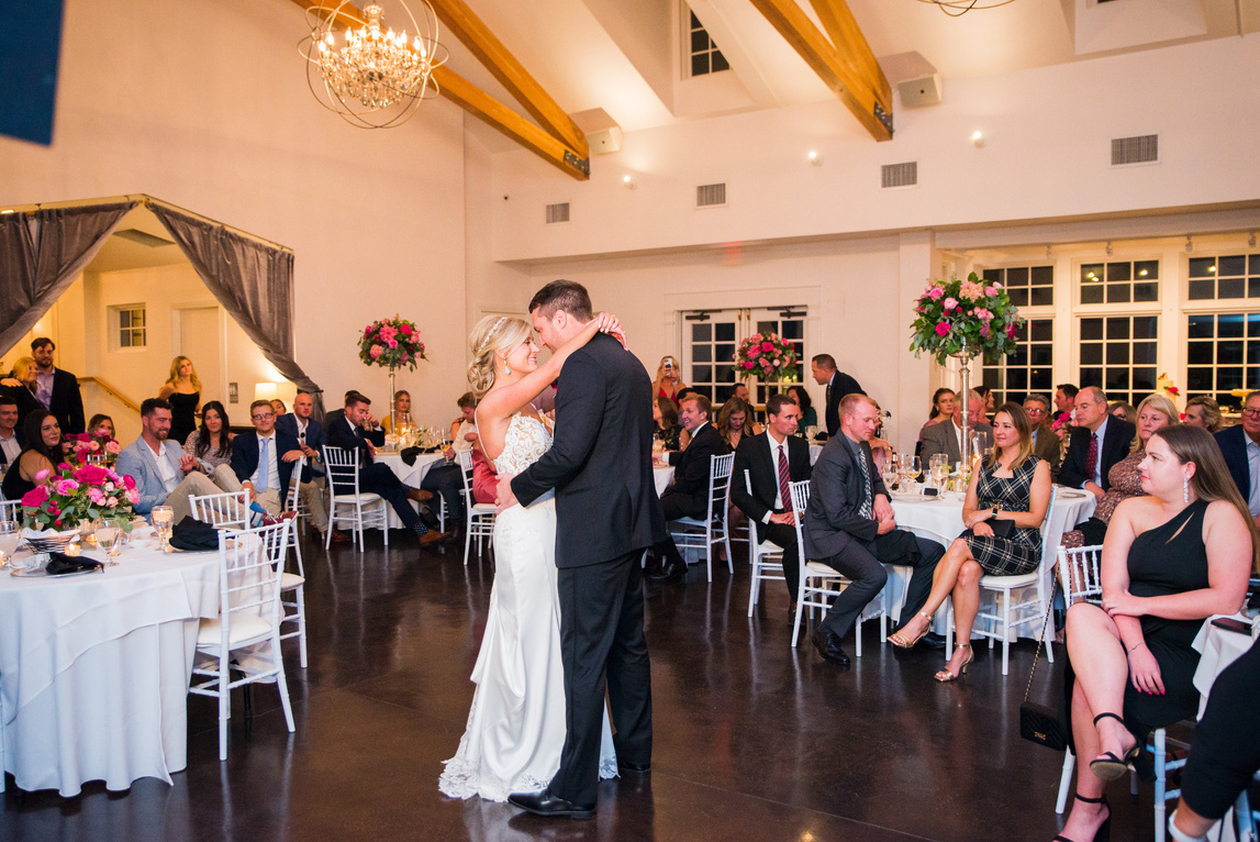 A couple share their first dance at their wedding reception at The Manor House, captured by Denver wedding photographer, Casey Van Horn.